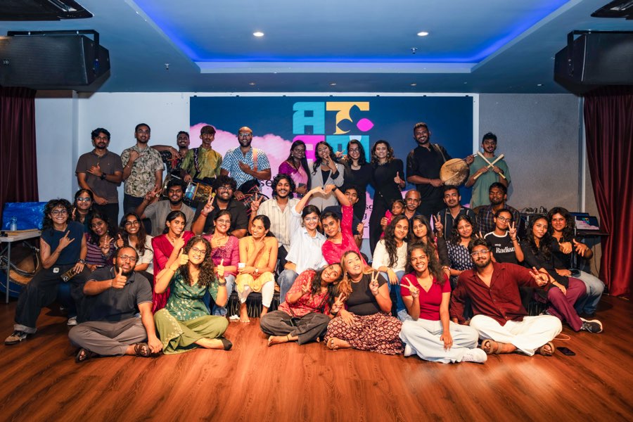 The folk singing cohort with their instruments